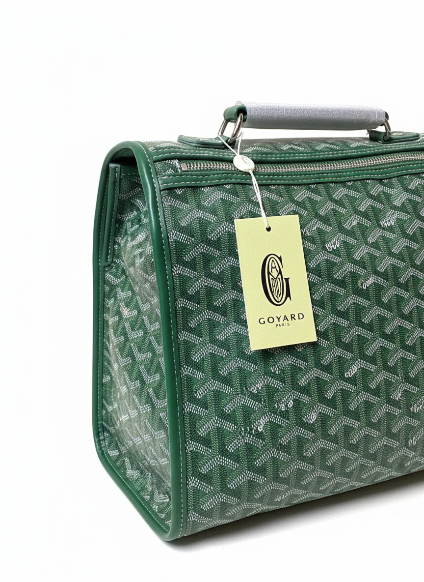 Goyard Saint Léger backpack in green Goyardine canvas and leather trim