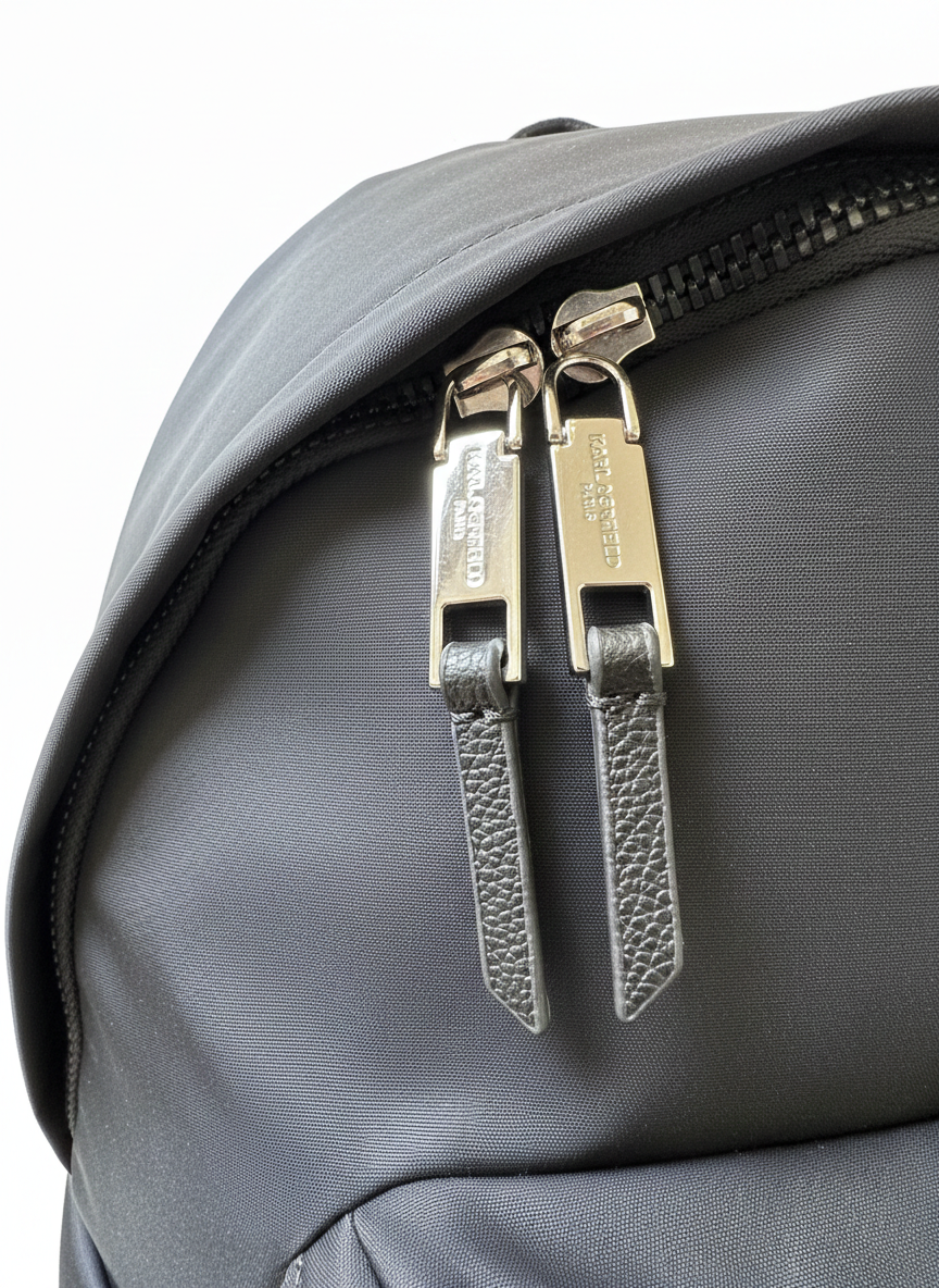 Karl Lagerfeld Paris Voyage Backpack in black nylon.